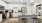 a kitchen with white cabinets