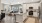 a kitchen with white cabinets