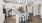 a kitchen with white cabinets