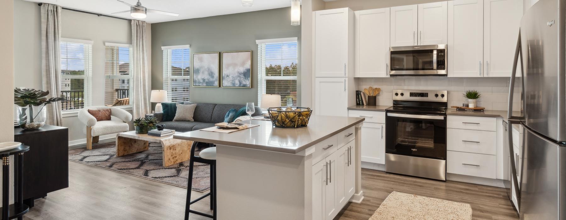 a kitchen with white cabinets